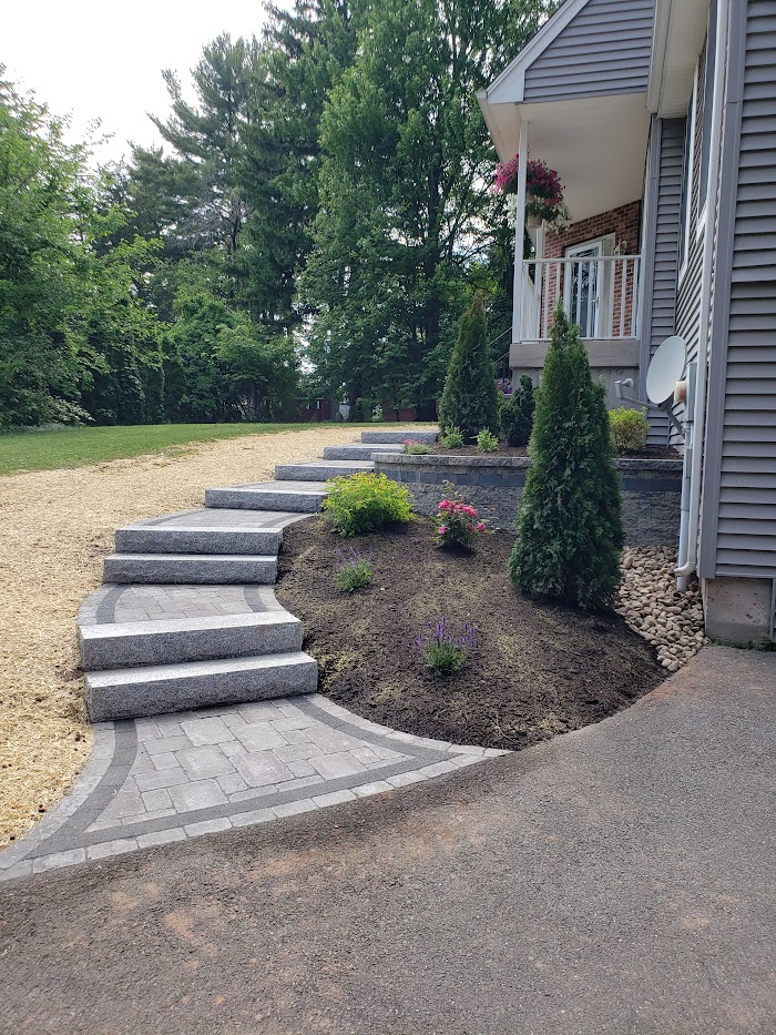 Granite steps with a flared walkway