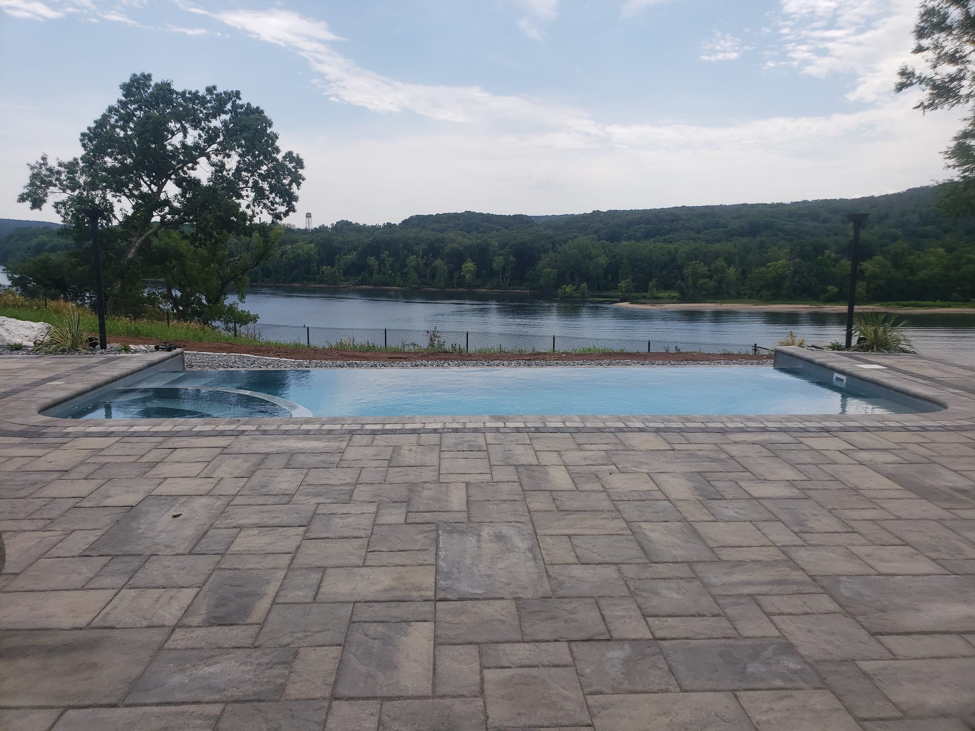 Poolside patio overlooking the river