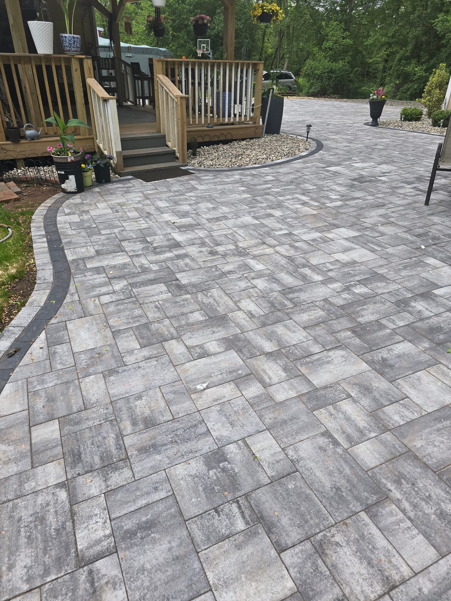 Backyard patio with a wraparound walkway