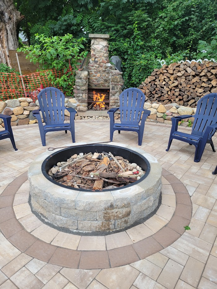 Fire pit lounge with an outdoor fireplace